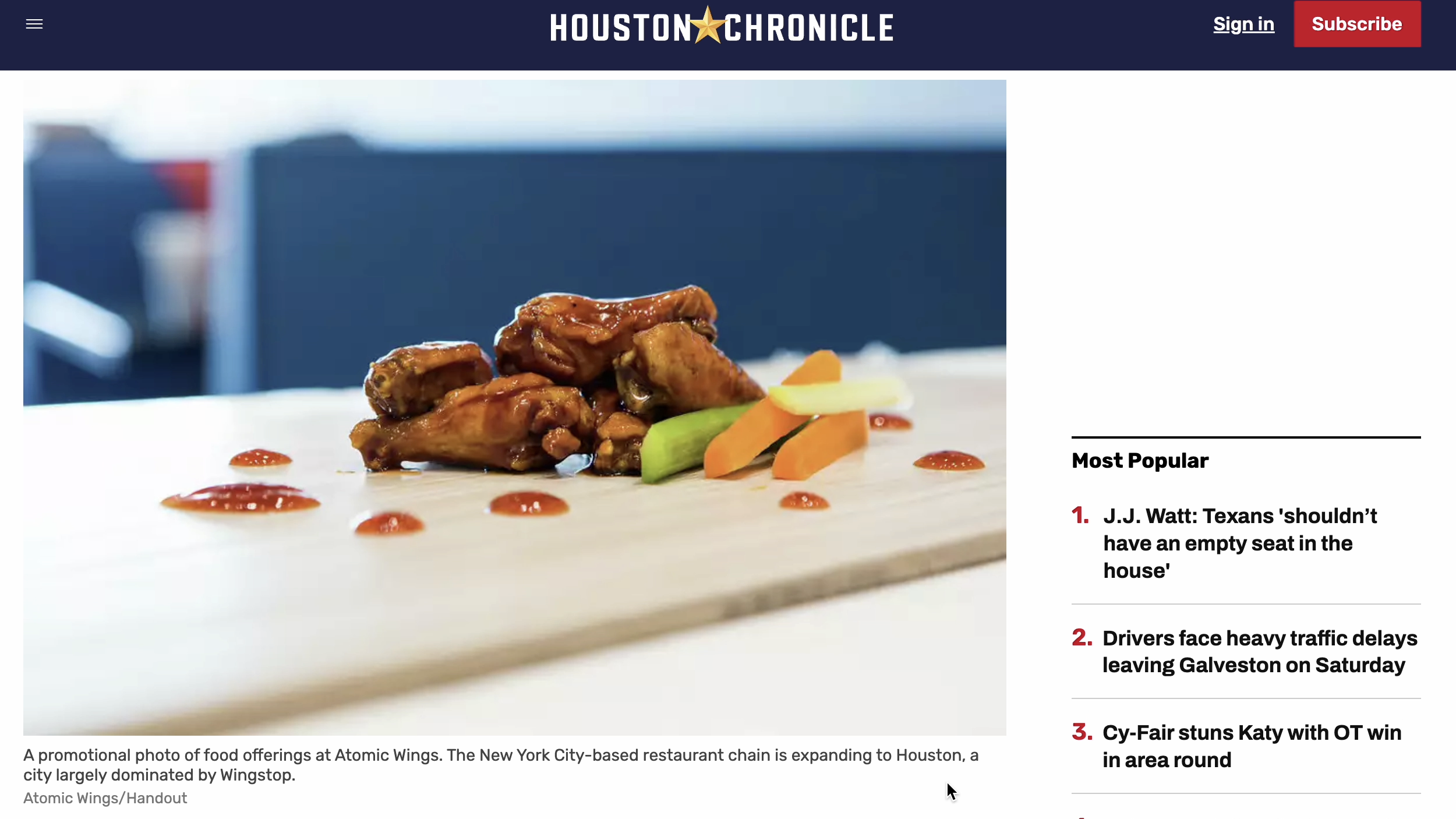Atomic Wings in the Houston Chronicle (Circulation: 179,008) (UVPM: 3,081,906)